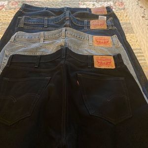 Men’s Levi Jeans (dark blue, classic, faded blue & black). Size 38/32.  4 /$30